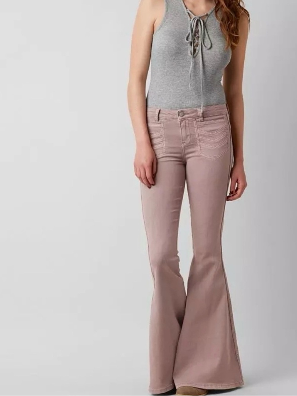 Free People High-Rise Flare Jeans in Dusty Rose.